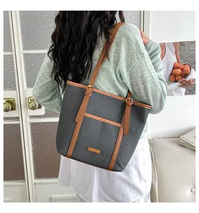 Stylish woven tote shoulder bag with brown straps and large capacity for daily casual use detail.