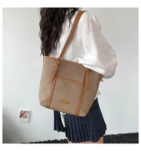 Stylish casual woven shoulder tote bag for women, large capacity commuter handbag with pocket.