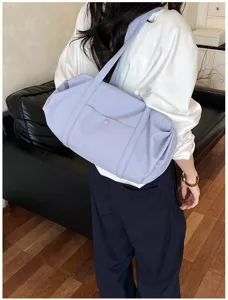 Casual light purple slouchy shoulder bag detail view, showing soft texture and large capacity style.