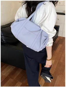 Light purple casual shoulder bag, stylish daily commute handbag with spacious capacity.