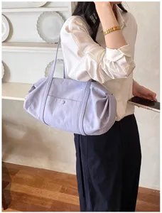 Chic light purple slouchy shoulder bag for women, trendy daily tote with soft fabric and chic design.