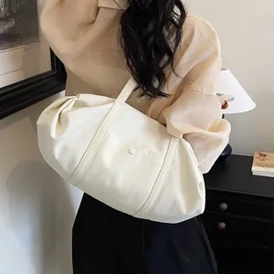 Casual slouchy shoulder bag for women, large capacity stylish tote bag with soft fabric design.