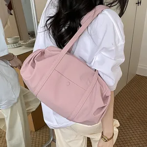 Casual pink shoulder bag for women, stylish daily tote bag with comfortable dual straps.