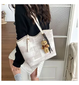Casual large capacity commuter shoulder tote bag featuring stylish plaid pattern and cute bear pendant.