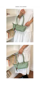 Green leather shoulder bag for women, stylish underarm handbag with top handle and flap.