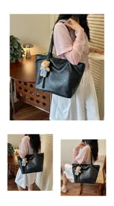 Minimalist black tote bag for women, large capacity shoulder bag with cute bear pendant for daily commute.