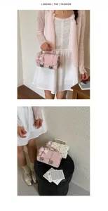 Chic vintage polka dot crossbody bag with pearl bow and metal locks for women summer style.