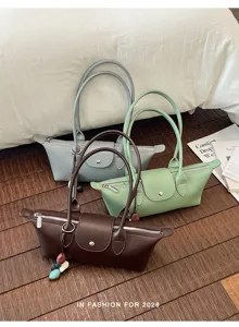 Women minimalist shoulder underarm bag detail, premium style daily commute fashion handbag.