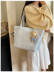 Casual light blue tote bag for women, large capacity shoulder bag, stylish commuting handbag.