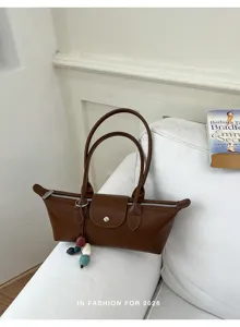 Women brown leather underarm shoulder bag minimalist chic fashion commuting handbag.