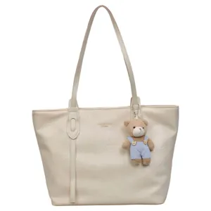 Elegant beige PU leather tote bag for women, spacious casual shoulder bag with cute bear pendant.