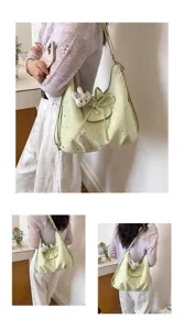 Sac bandoulière vert clair imprimé étoiles avec nœud et pendentif mignon, fourre-tout élégant.