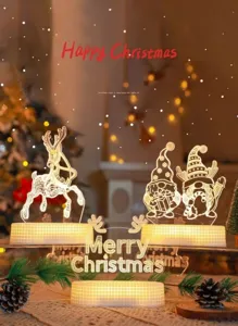 Detailed close-up view of 3D acrylic Christmas night light with a warm yellow LED glow