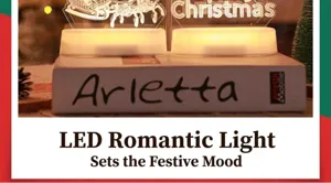 Close-up of 3D acrylic Christmas night light with warm LED glow and Santa design