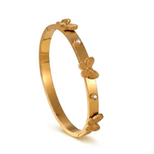 Elegant titanium steel open bangle with butterfly and rhinestone charms for women fashion style.