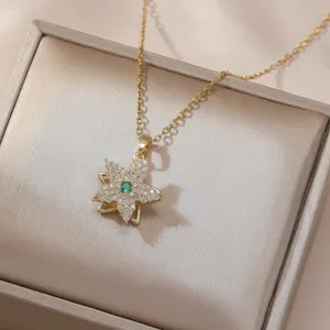 Exquisite gold flower pendant necklace sparkling cubic zirconia with green center stone chic jewelry.
