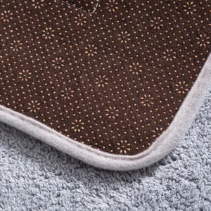 Non-slip doormat backing detail, absorbent household floor rug with anti-slip dots and neat edge.