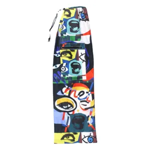 Long diving fin bag with bold pop art face print, drawstring and shoulder strap for gear.