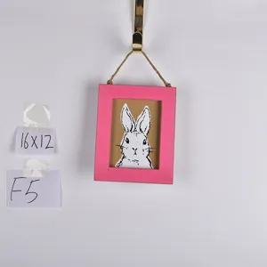 Easter wooden photo frame wall hanging with cute rabbit illustration and pink border detail.