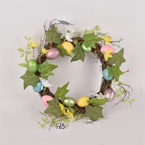 Easter decorative wreath with colorful eggs and leaves for spring home and shop window display.