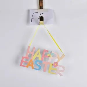 Wooden Easter hanging sign detail, pastel letter decoration with flower and butterfly accent.