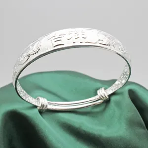 Bracciale rigido regolabile placcato argento stile etnico con incisioni beneauguranti