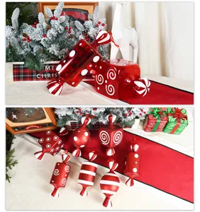 Primer plano de caramelos decorativos rojos y blancos, perfectos para accesorios de fotos.