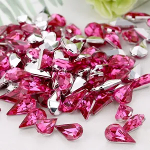 Close-up detail view of pink waterdrop acrylic rhinestones, ideal for DIY crafts decoration.