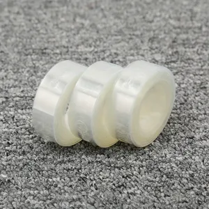 Transparent balloon chain rolls detail view, plastic balloon fixing tool for party decoration.