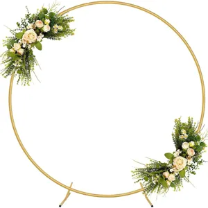 Golden metal round arch backdrop stand with realistic floral decorations for parties.