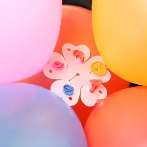 Detailed close-up of plastic plum blossom balloon clip for party decor 6-in-1 flower tool