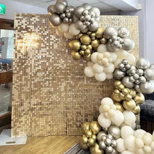Shimmer sequin wall backdrop detail, gold square sparkling panels for party and wedding decoration.