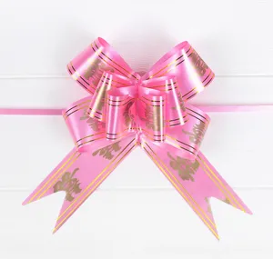 Large pink pull bow with gold border and Xi character for wedding car and festive decoration