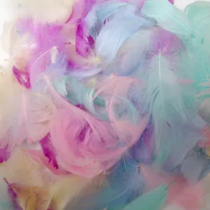Close-up of colorful pastel fluffy goose feathers, ideal for DIY crafts and balloon fillers.