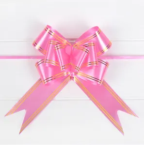 Pink pull bow with gold edges for wedding car decoration, party gift wrapping and festive events.