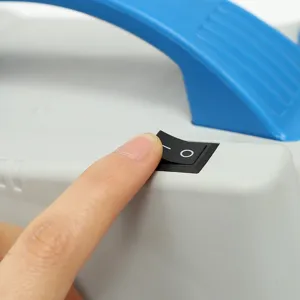 Close-up detail view of the electric balloon pump power switch, durable plastic housing.