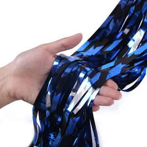 Close-up of blue and black herringbone foil fringe curtain material, ideal for party decor