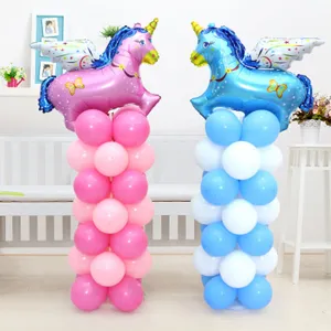 Detail view of unicorn balloon column showing cute foil balloons for party setup.