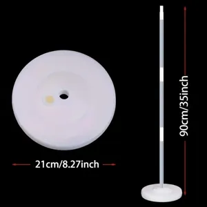 Detail view of white balloon column stand base and pole with clear dimension markings.