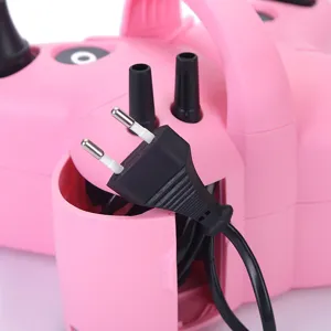 Electric balloon pump detail view, showing dual nozzles and plug. Portable air inflator tool.