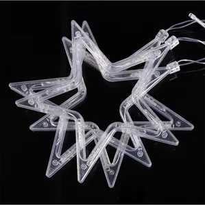 Close-up view of transparent star-shaped LED string light components with clear wiring details.