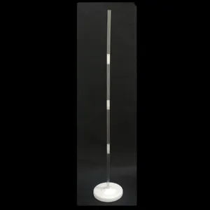 Clear detail shot of transparent balloon stand pole with white base for party decoration setup.