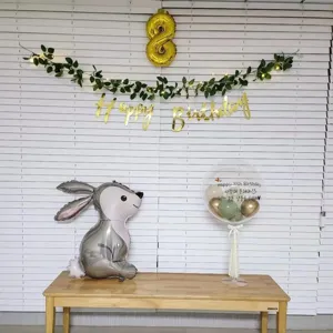 Birthday party balloon stand set with cute rabbit foil balloon and bobo balloon decoration.
