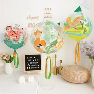Balloon table stand kit with clear jungle animal print bobo balloons for birthday party decor.
