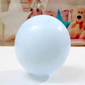 Light blue macaron latex balloon detail shot, perfect for wedding and birthday party decor.