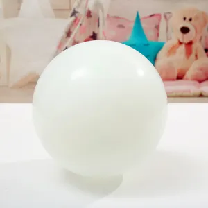 Close-up detail shot of a classic white latex balloon for party and wedding decoration.