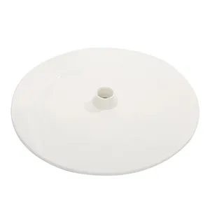 Detail view of white plastic round base plate accessory for balloon arch decoration party setups.