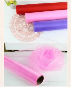 Crystal tulle fabric rolls for wedding decoration, floral wrapping and party DIY crafting.