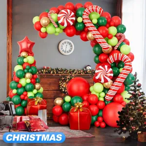Christmas balloon arch kit with candy cane foil balloons and tree setup for party decor.