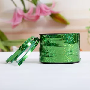Green laser balloon ribbon detail, perfect for wedding decoration and party wrapping.